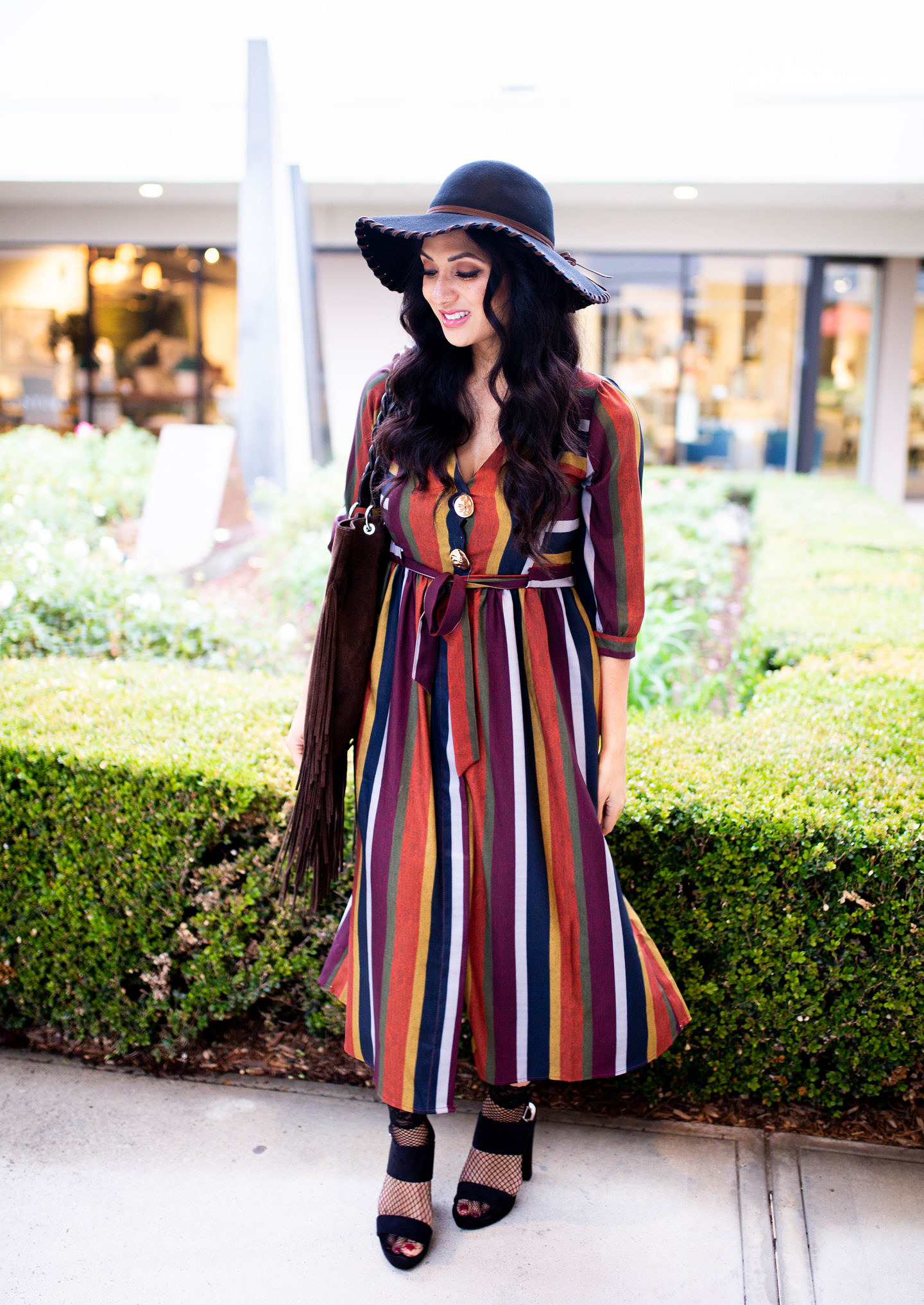 Curious how to style a multi-stripe dress? Orange County Blogger Debbie Savage is sharing her favorite way to style a multi-stripe dress. See how here!