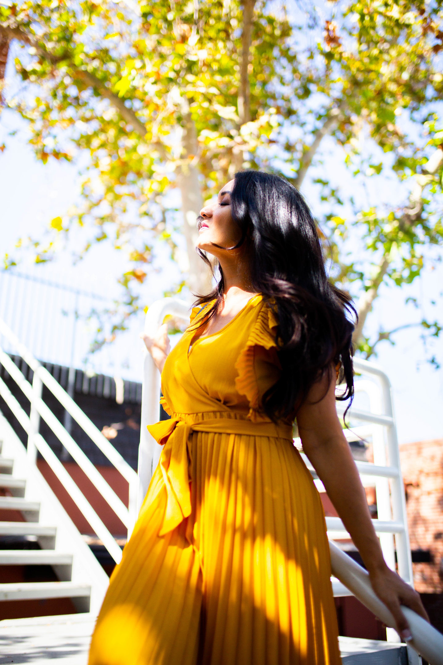 Curious how to incorporate a yellow pleated dress into your wardrobe? Orange County Blogger Debbie Savage is sharing her favorite way to style a yellow pleated dress here!