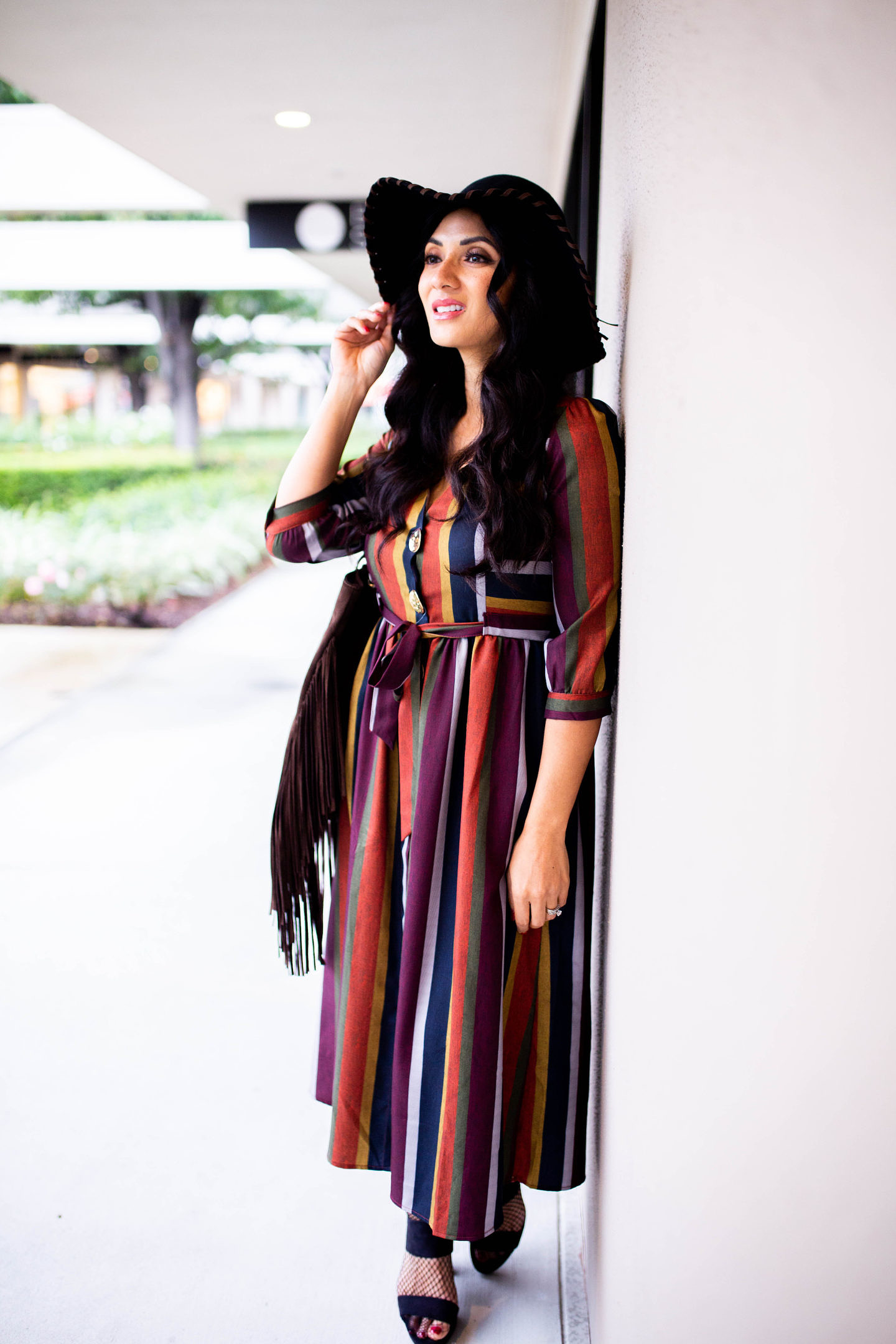 Curious how to style a multi-stripe dress? Orange County Blogger Debbie Savage is sharing her favorite way to style a multi-stripe dress. See how here!