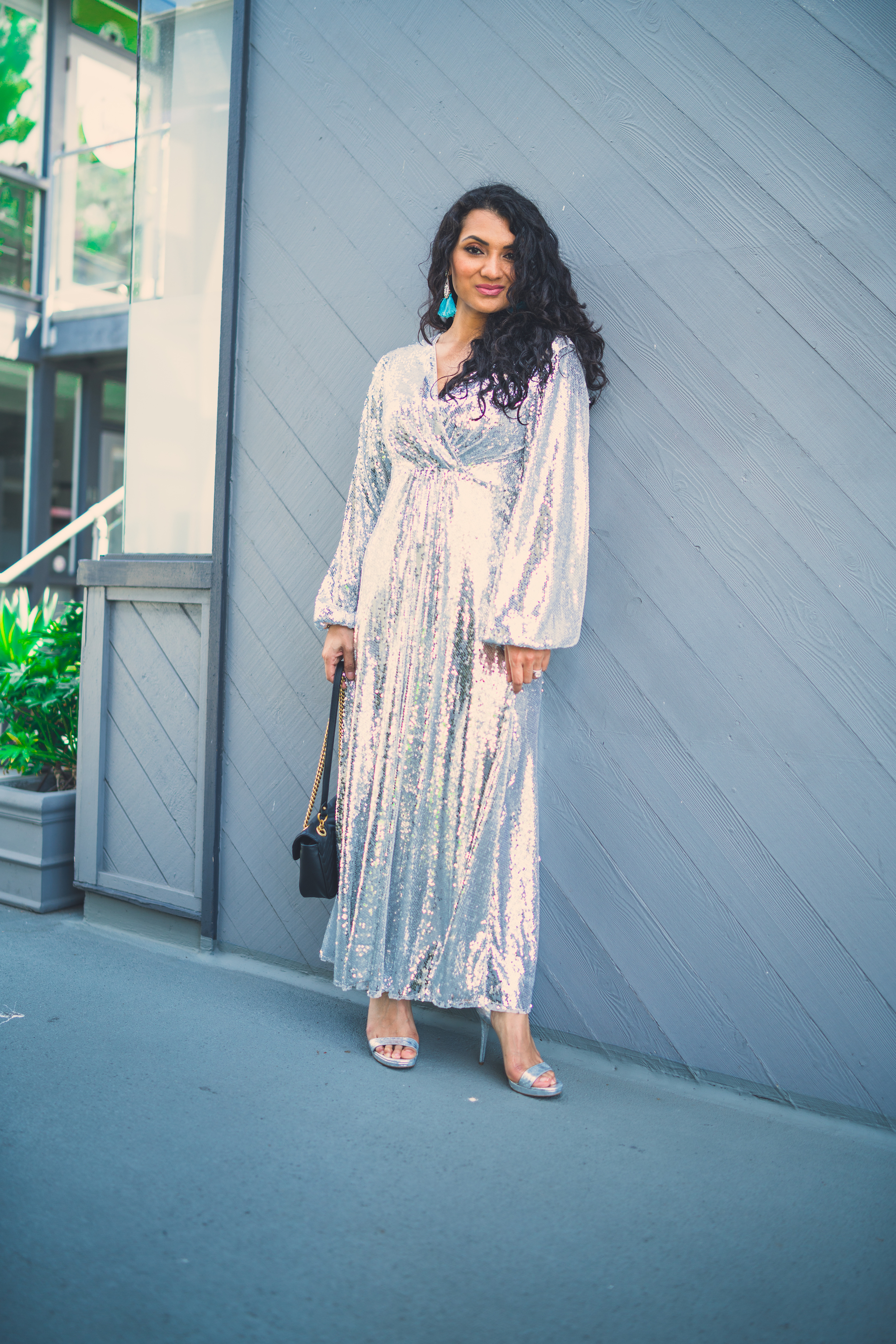 Bring on the glam with the perfect metallic sequin maxi dress! Curious how to style one? Orange County Blogger Debbie Savage is sharing how to style one. Click to see how HERE!