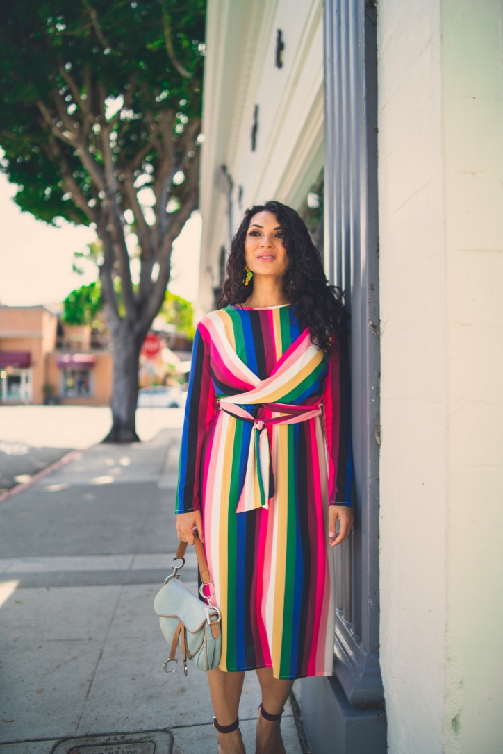 Not sure how to style a rainbow printed dress? Orange County Blogger Debbie Savage is sharing her favorite way to rock and style a rainbow printed dress.  See how HERE!